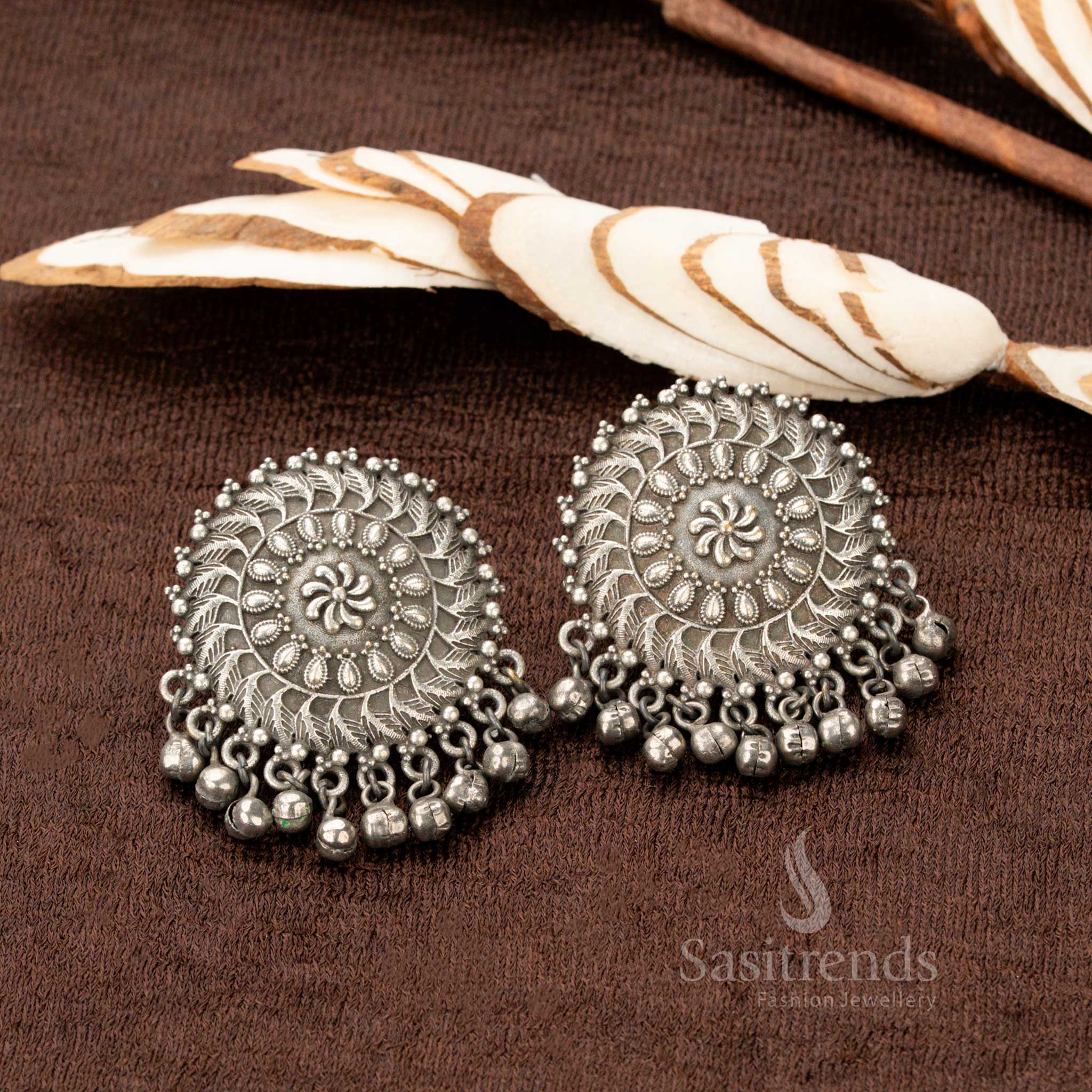 Grand oxidised floral necklace adorned with deep black stones, an ornate bold pendant, and detailed matching earrings  - Sasitrends