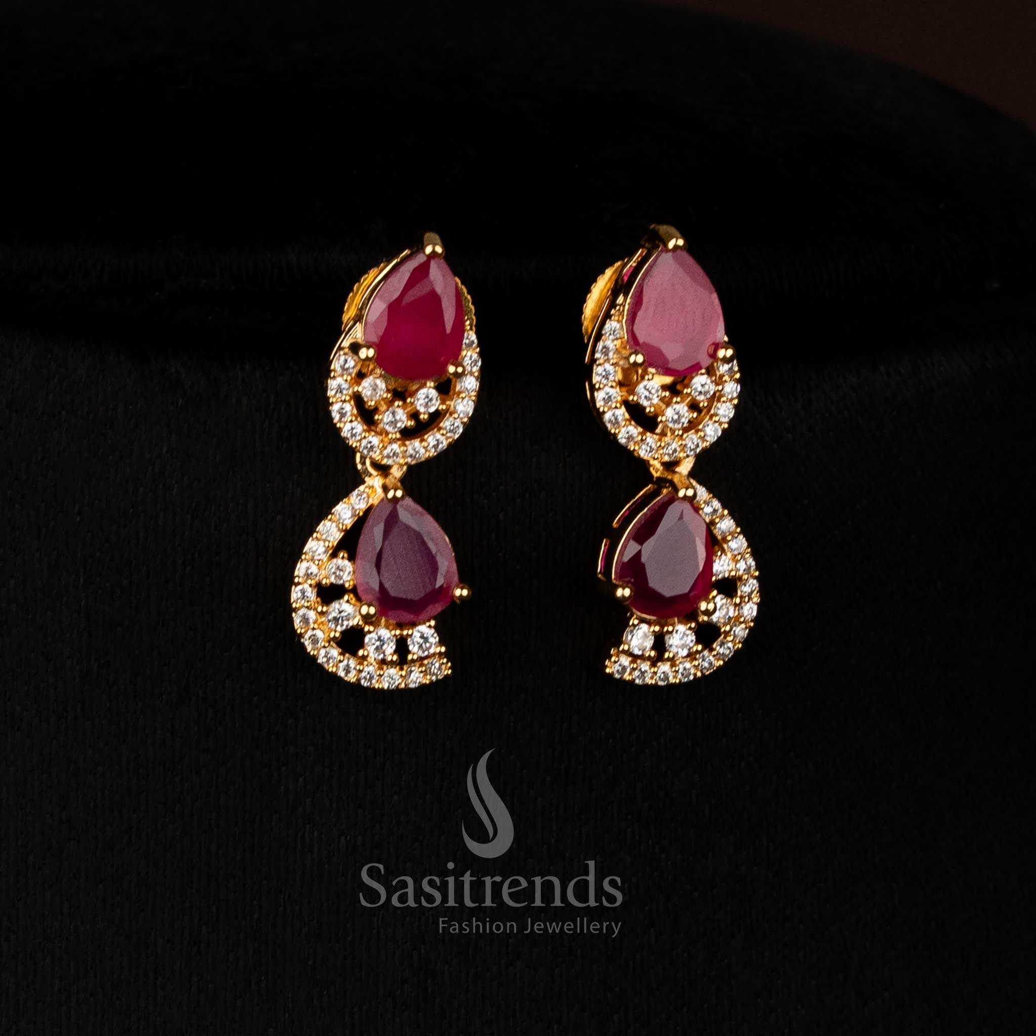 Radiant ruby gold plated teardrop loop earrings with sparkling AD stones for luxury parties - Sasitrends
