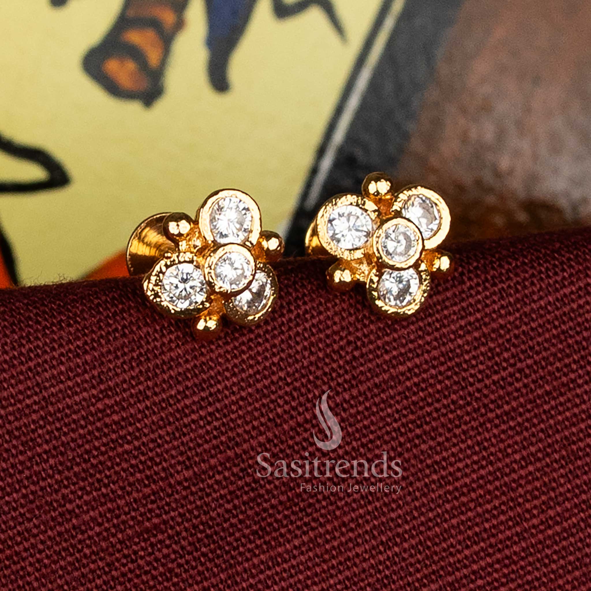Graceful white impon addigai micro gold plated floral AD stone stud earrings suited for festive ceremonies - Sasitrends