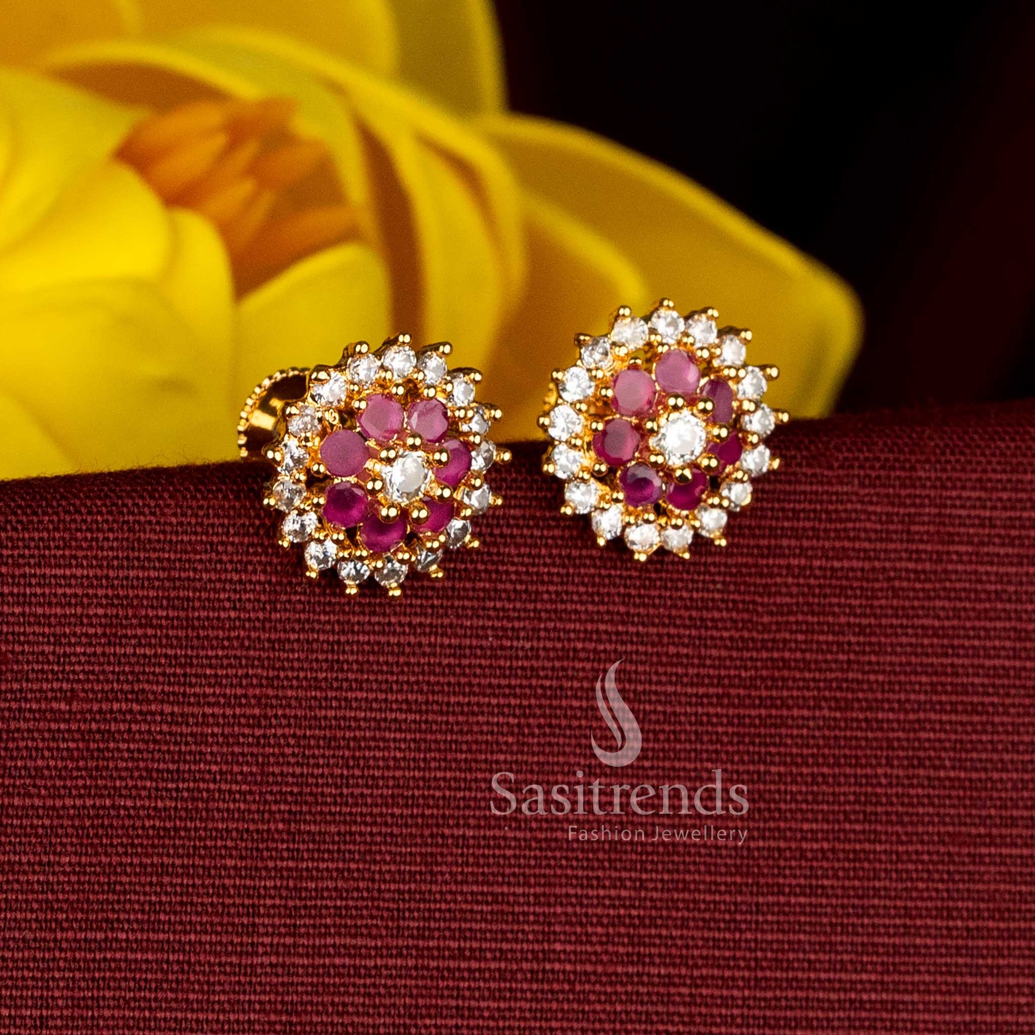 Radiant micro gold plated AD white-ruby circular flower stud earrings designed for ceremonial and festive traditional dressing, ideal with silk saree and half saree - Sasitrends