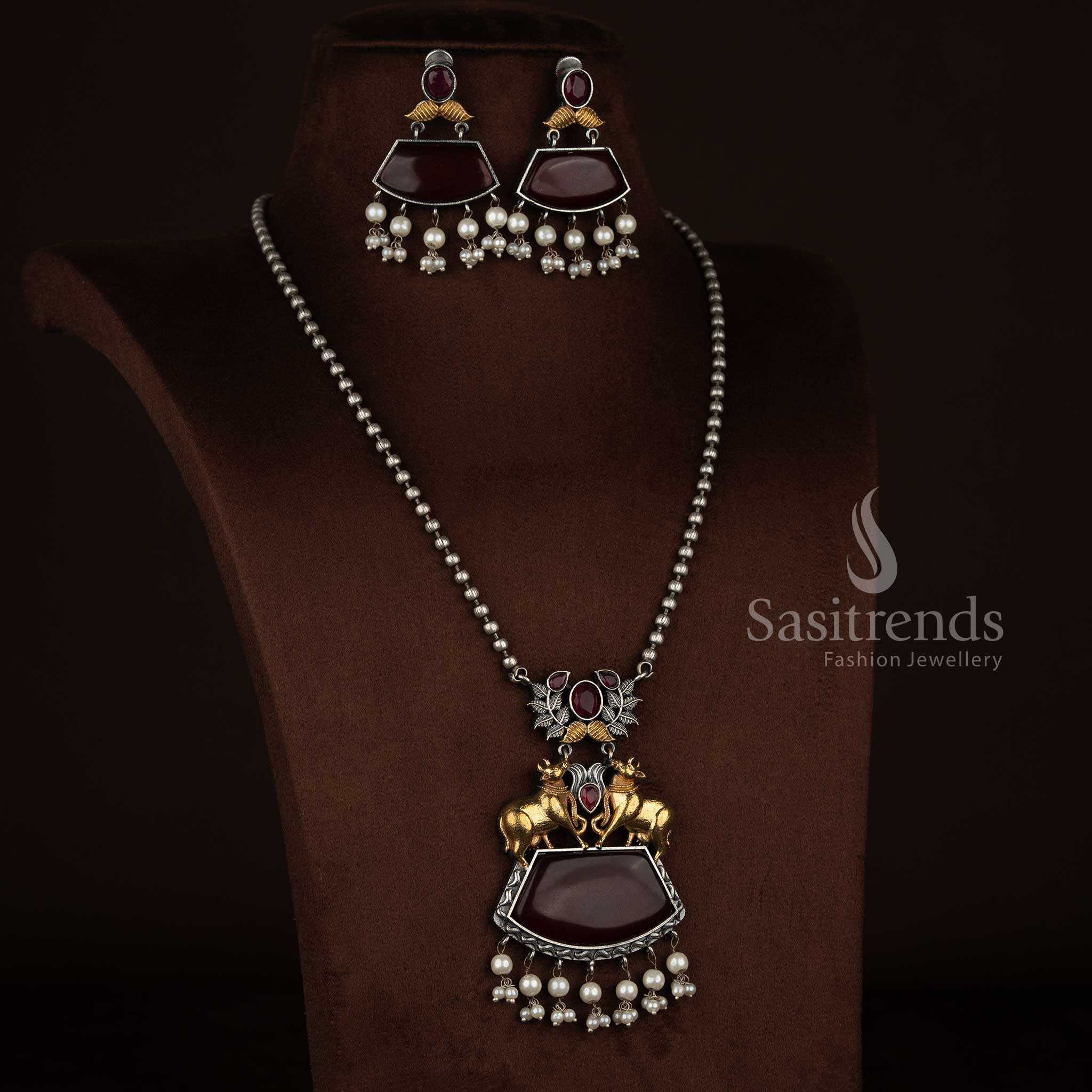 Majestic Antique Oxidised 92.5 Silver Plated Dual Tone Pichwai Cow Leaf Statement Necklace Set with Trapezoid Stones Pearl for festive evenings Sasitrends