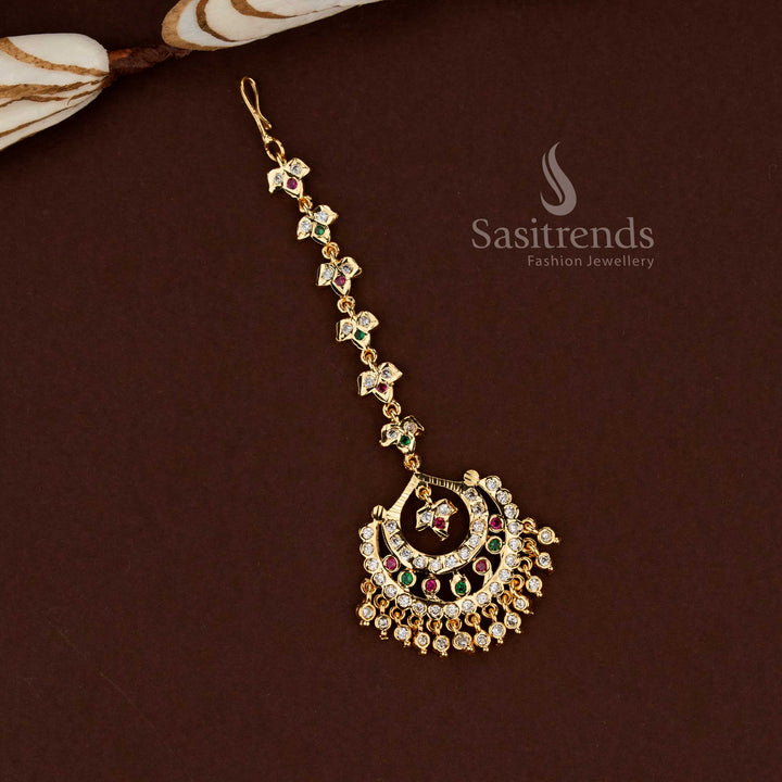 Festive multi stone crescent moon style Impon micro gold plated American diamond maang tikka suitable for bridal wear wedding events and cultural celebration jewellery - Sasitrends