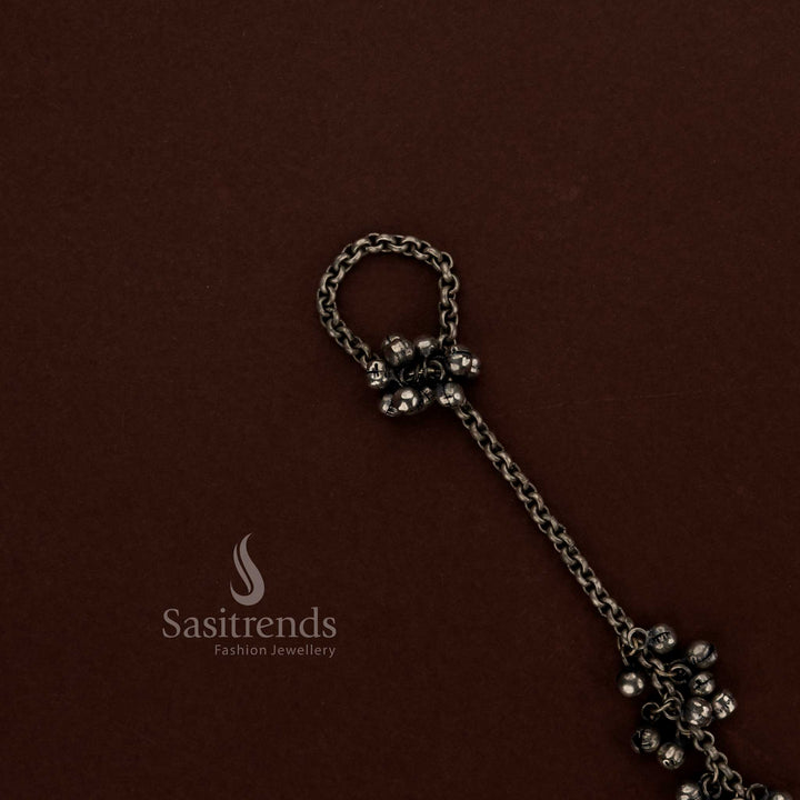 Elegant oxidised silver ghungroo haath phool anklet with attached chain toe ring created for Navaratri dance nights festive wear and ethnic jewellery fashion - Sasitrends