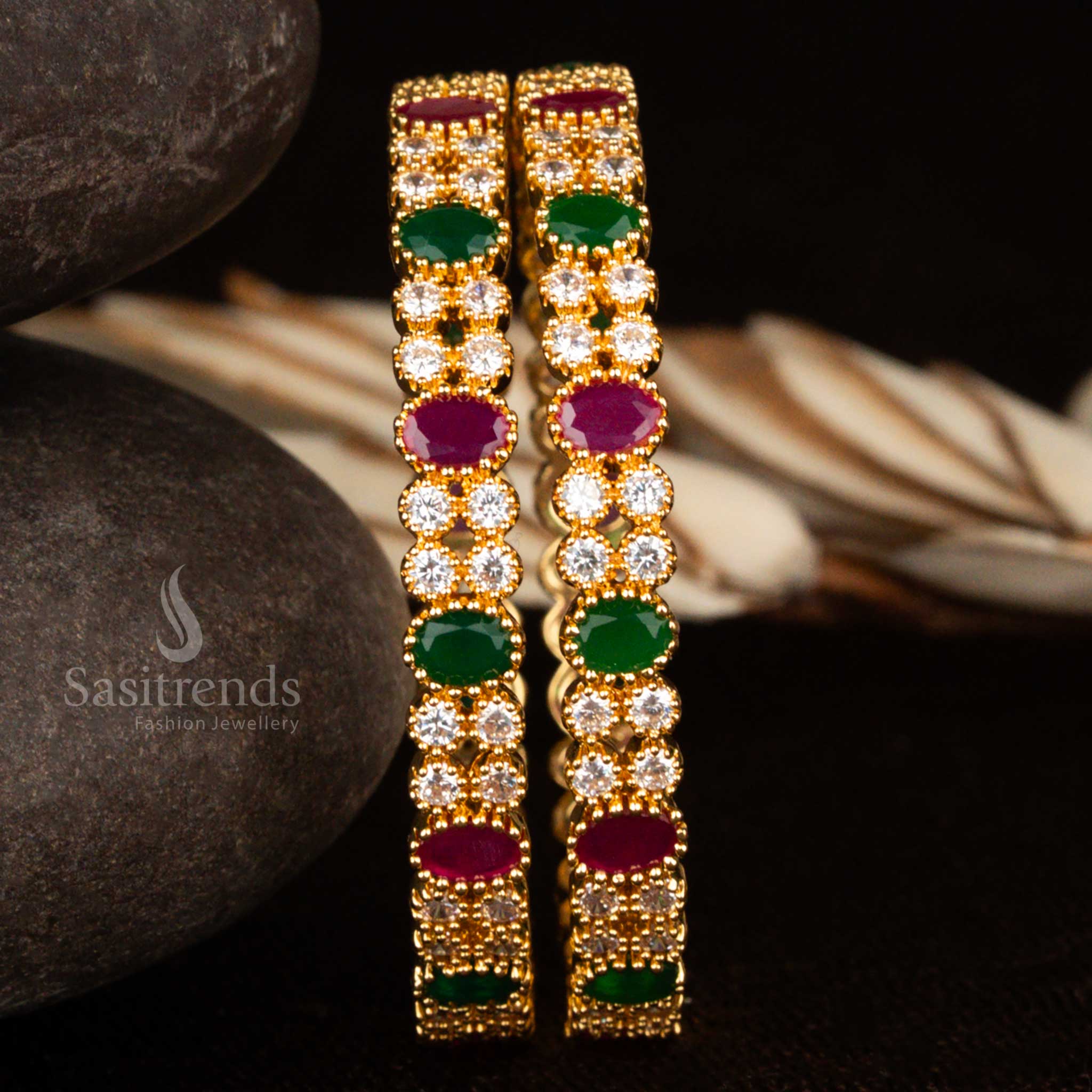 Multi-colour American diamond bangles in micro gold finish with vibrant floral motifs – an eye-catching festival and traditional jewellery choice full of colour by Sasitrends
