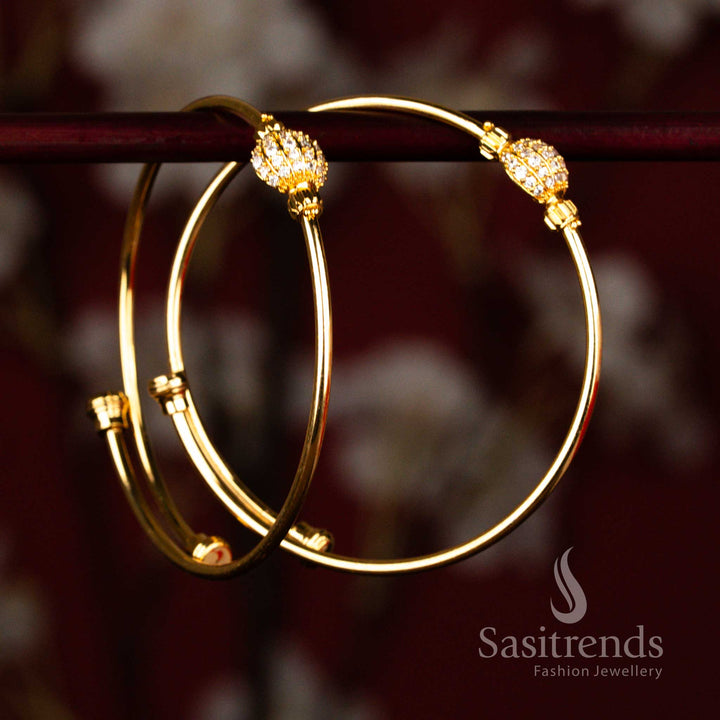 Real gold look 1 gram jewellery bangles featuring detailed micro gold plated white American diamond studded spherical centre design