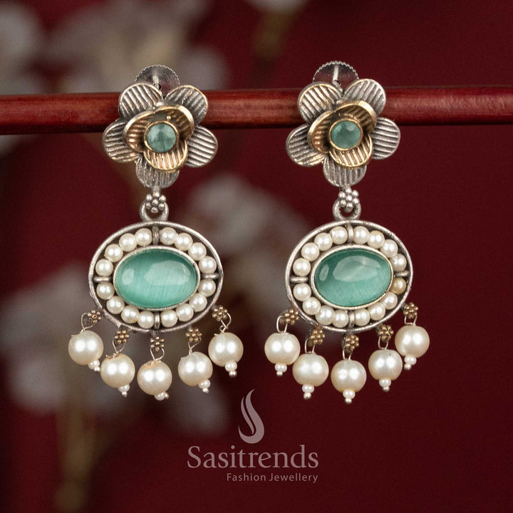 Elegant oxidised silver floral studs featuring mint Monalisa stones, sculpted floral design and pearl cluster hangings for festive occasions - Sasitrends