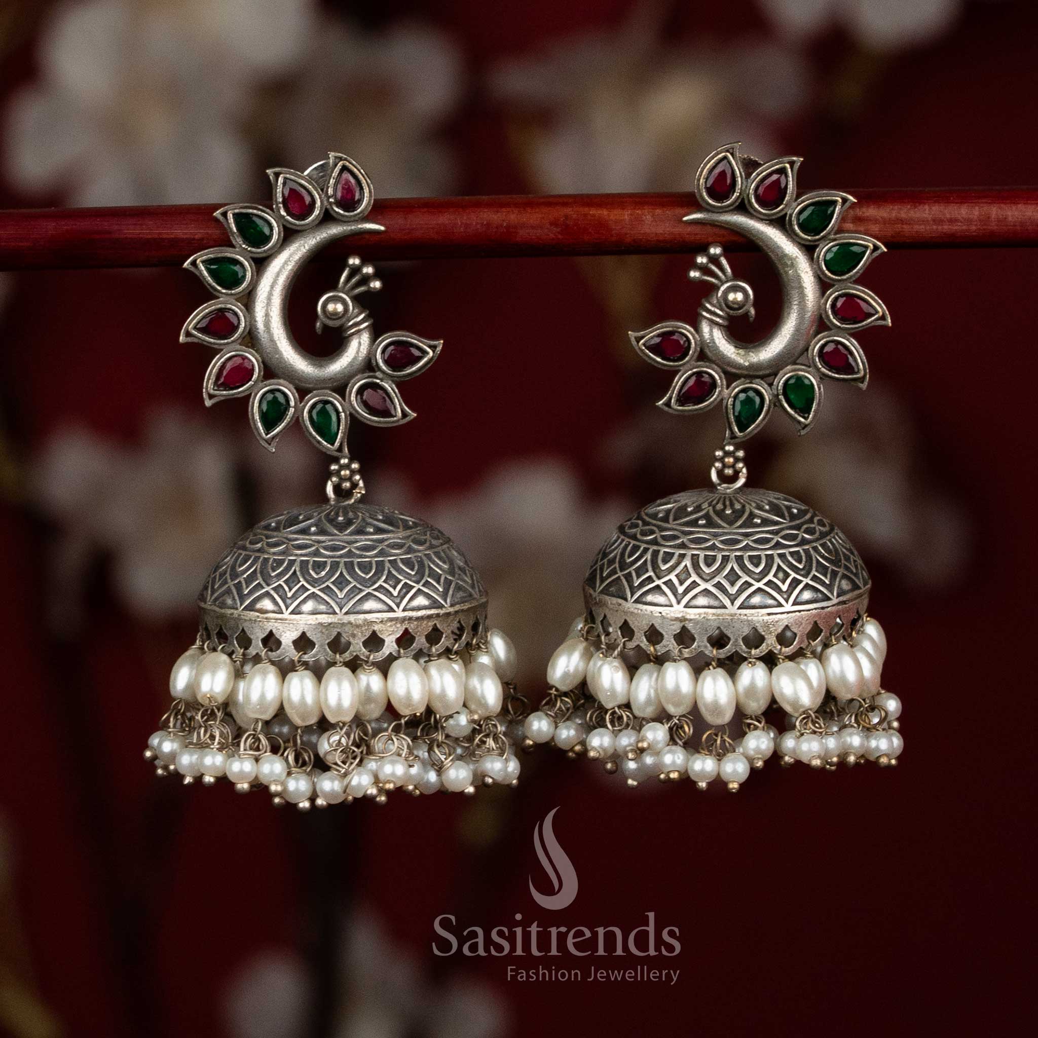 Vibrant tones oxidised 92.5 silver ruby green peacock motif dome jhumkas with pearl fringes for party charm - jewellery - Sasitrends