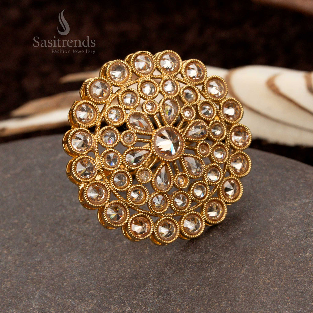 Elegant antique gold ring with intricate filigree work and geometric stone arrangement - Sasitrends
