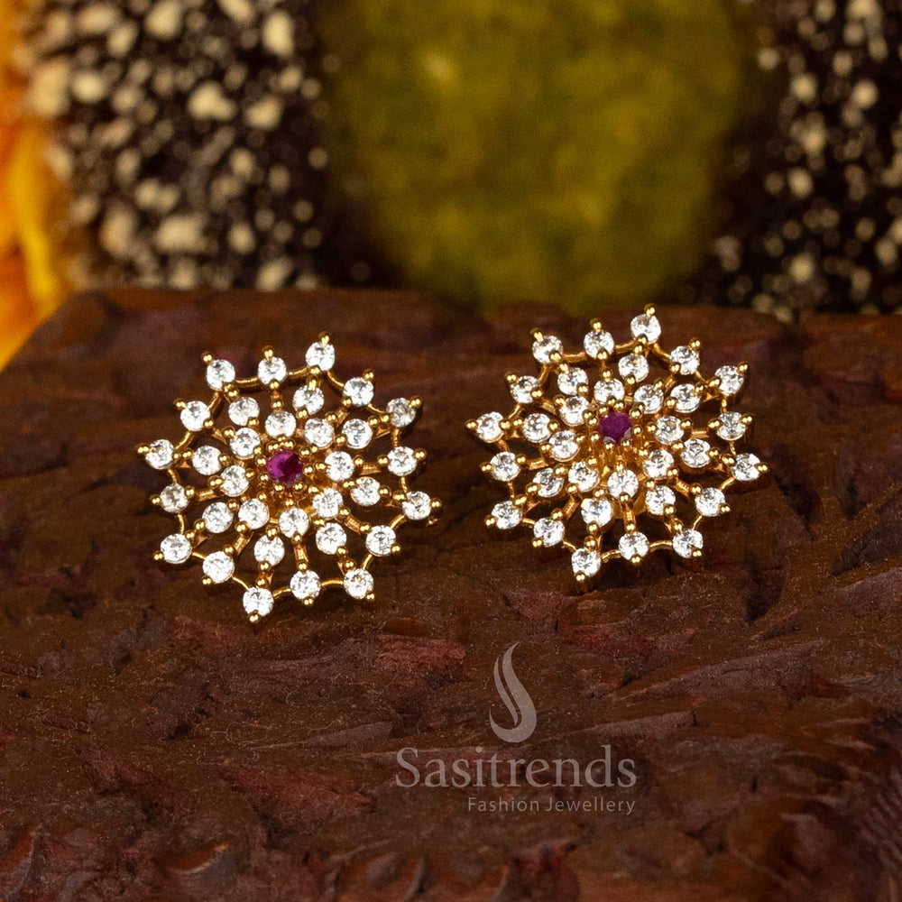 Intricate Floral Burst American Diamond Stud Earrings With Ruby Centrepiece And Radiating White Stone Petals – A Regal Statement For Saree And Temple Jewellery Wear – Sasitrends