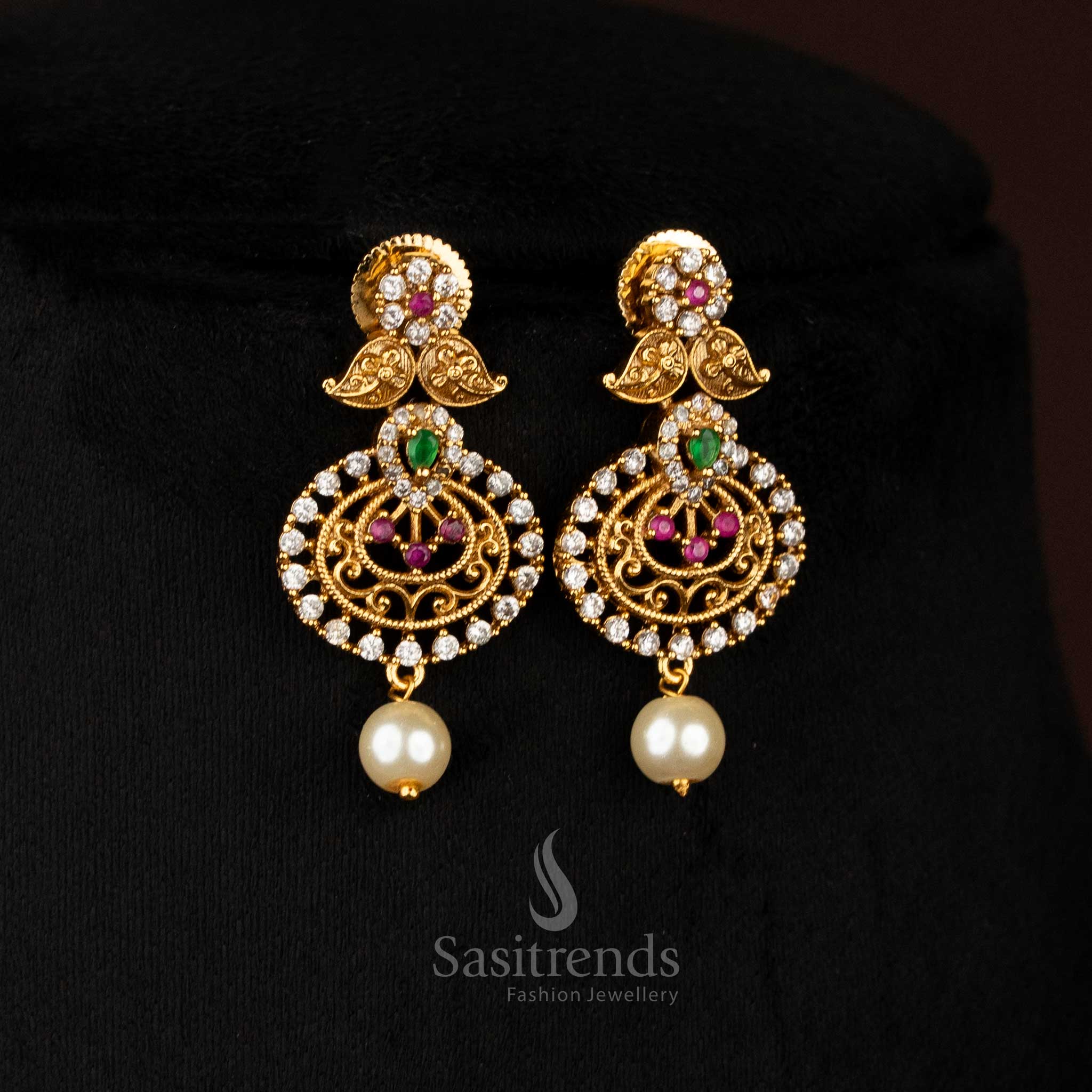 Dazzling matte gold plated multi-colour AD earrings by Impon, decorated with paisley pendant and pearl drops for luxurious celebration styling – Sasitrends