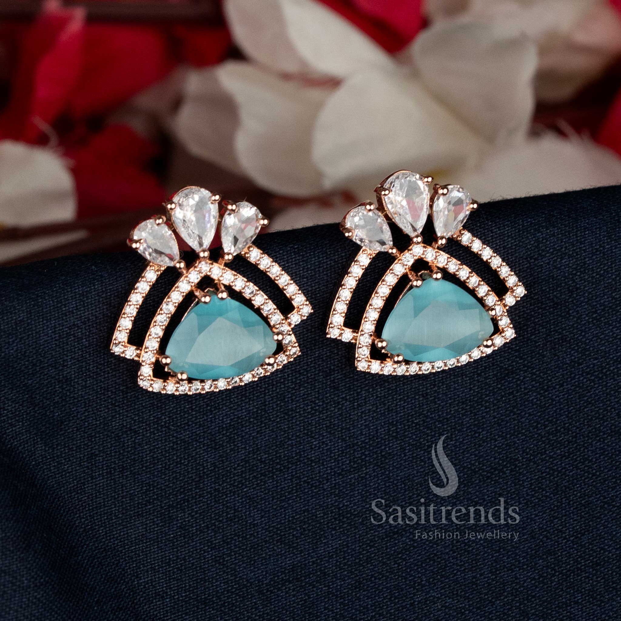 Tranquil Rose Gold Plated Triangular AD Stud Earrings with light blue gems, ideal for festive or cocktail gatherings — Sasitrends