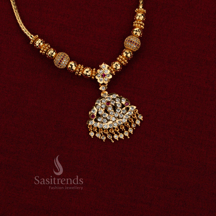 Radiant bell impon attigai micro gold plated AD stone golden ball chain necklace white ruby with guaranteed one gram and 24 carat gold look for weddings and festive wear – Sasitrends