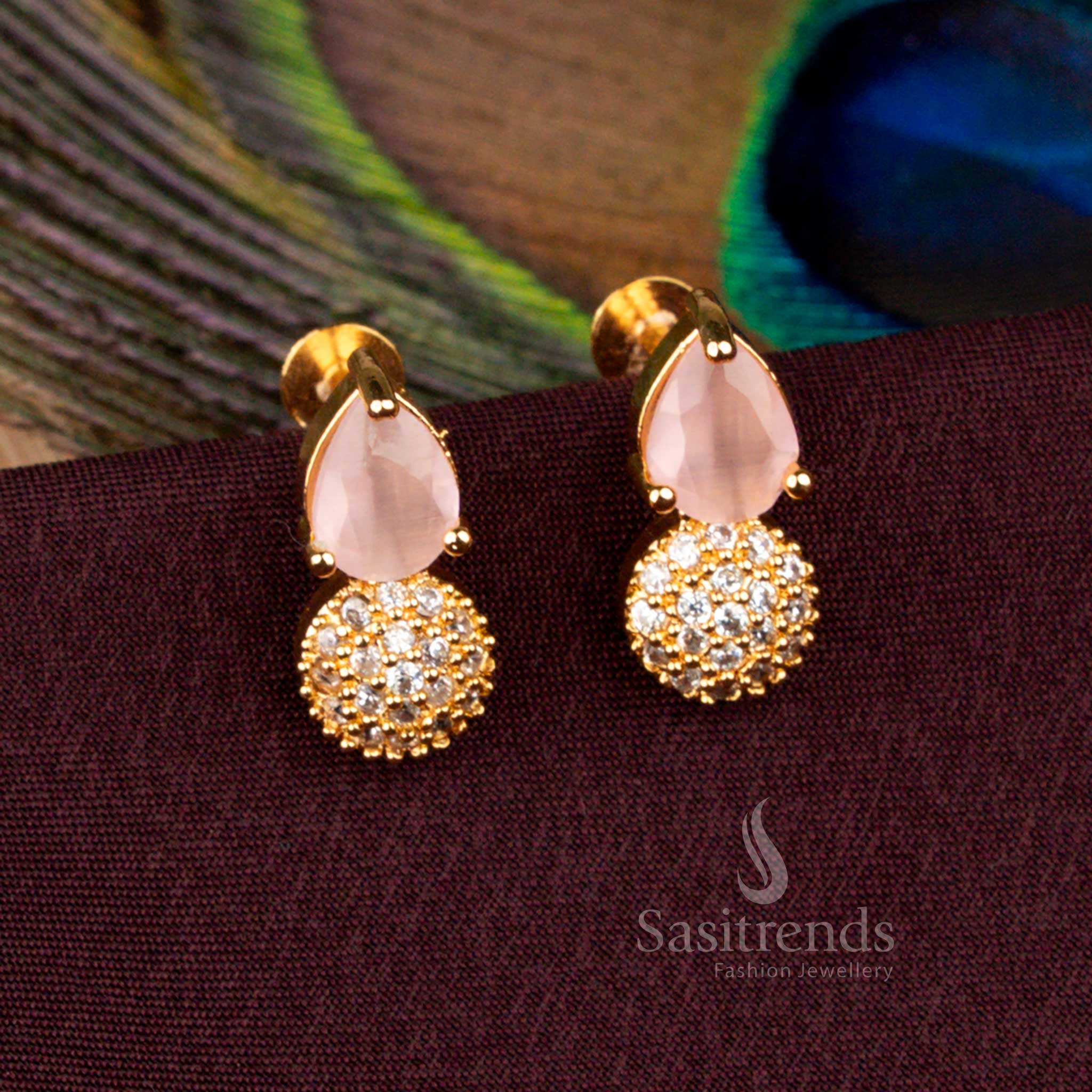 Divine teardrop AD stud earrings plated in gold shimmering with rose finish for bridal grandeur - Sasitrends