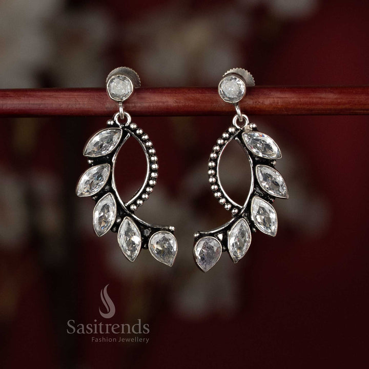 Polished white oxidised S-curve crawler stone earrings for refined office wear – Sasitrends