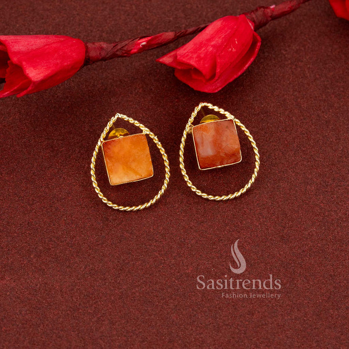 Elegant pear shaped natural peach stone rope finish gold plated studs offering subtle sophistication for routine wear - Sasitrends