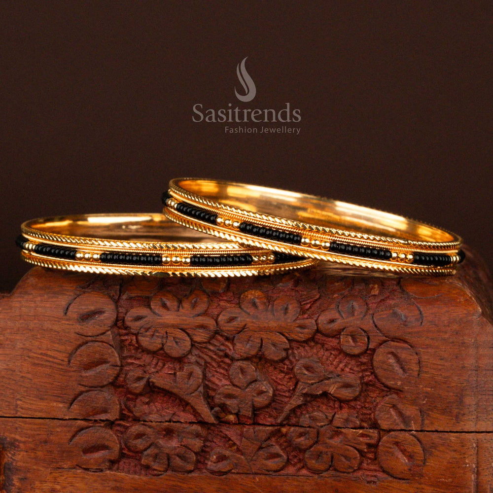 Regal look traditional micro gold plated black bead bangles for women inspired by classic temple jewellery motifs, radiating timeless beauty – online exclusive designer piece by Sasitrends