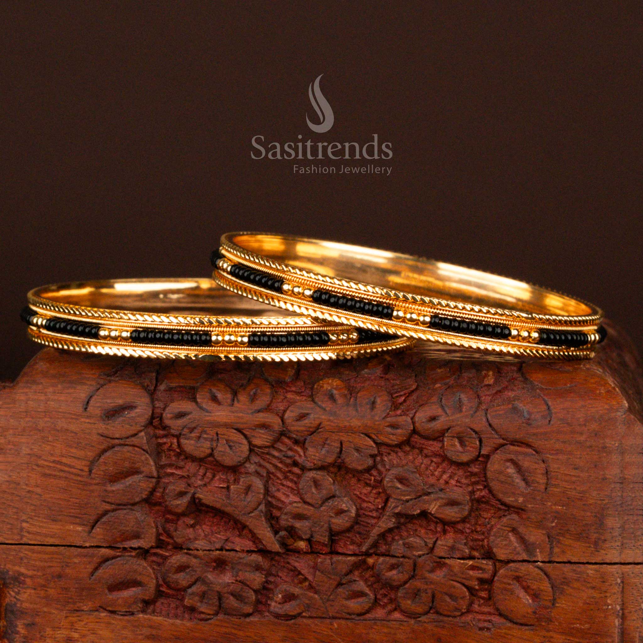 Regal look traditional micro gold plated black bead bangles for women inspired by classic temple jewellery motifs, radiating timeless beauty – online exclusive designer piece by Sasitrends