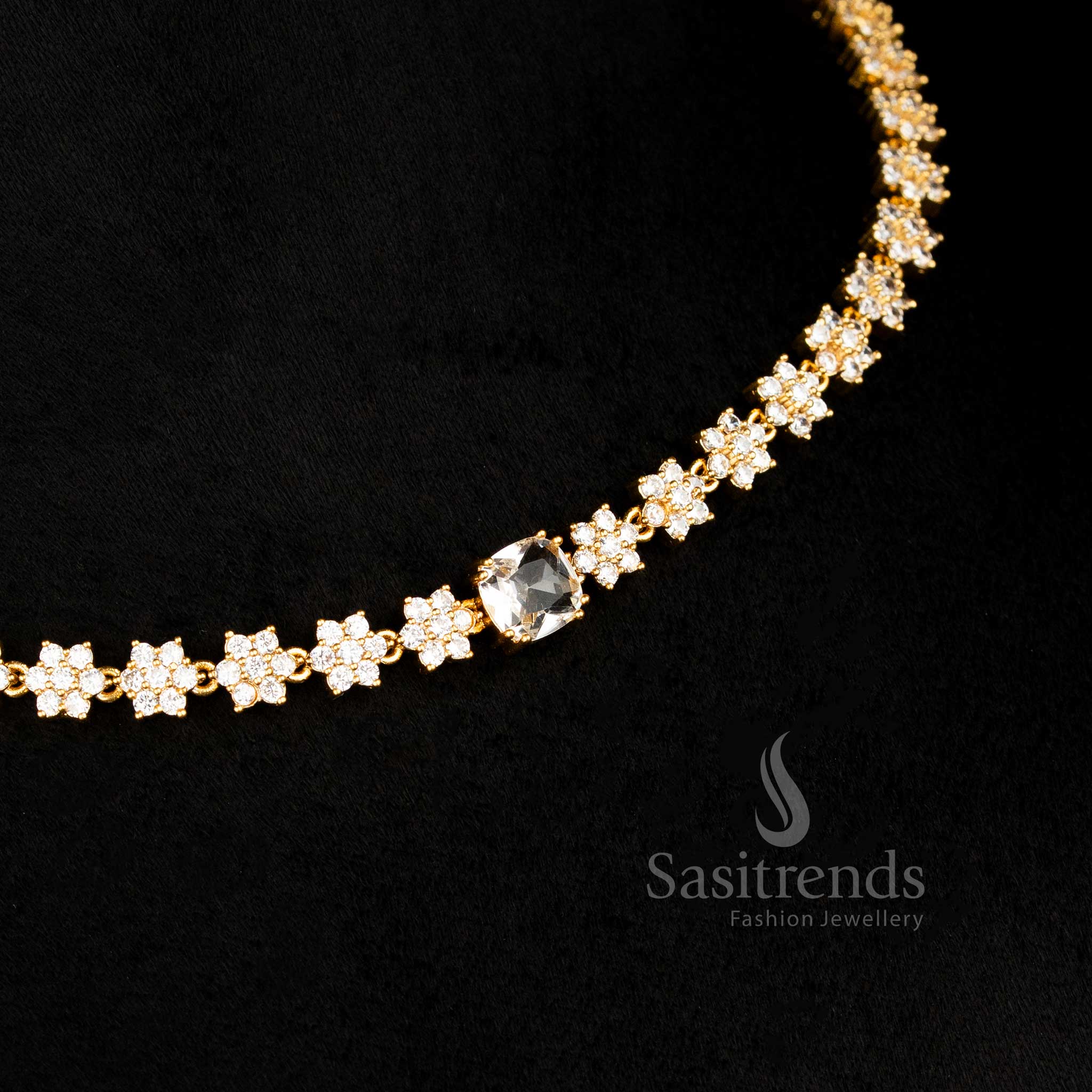 Radiant American diamond matte gold plated floral necklace jewellery set featuring white stones designed for wedding and reception beauty - Sasitrends