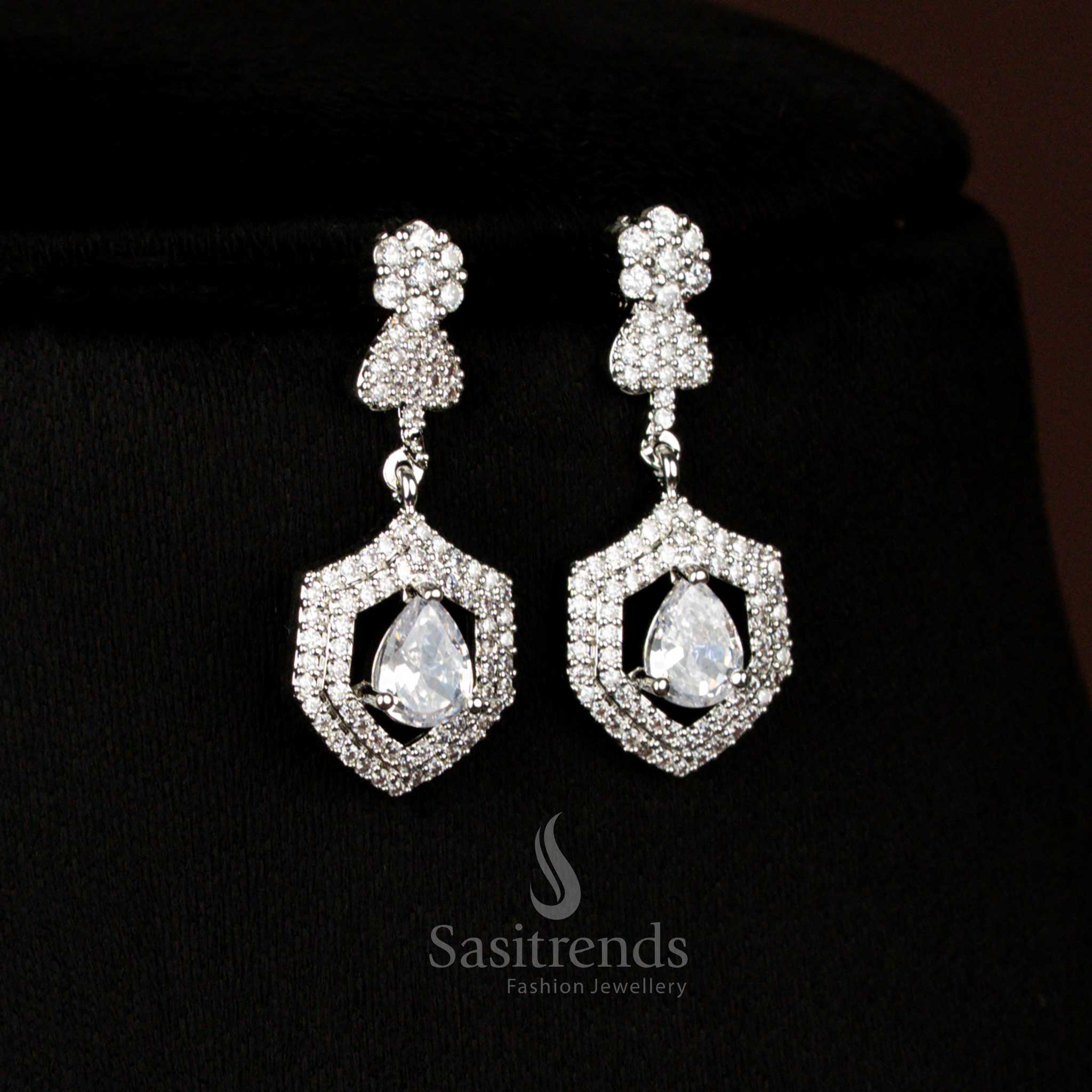 Elegant American Diamond rhodium silver plated heart and floral white earrings with teardrop pendant perfect for party wear and festive charm – Sasitrends
