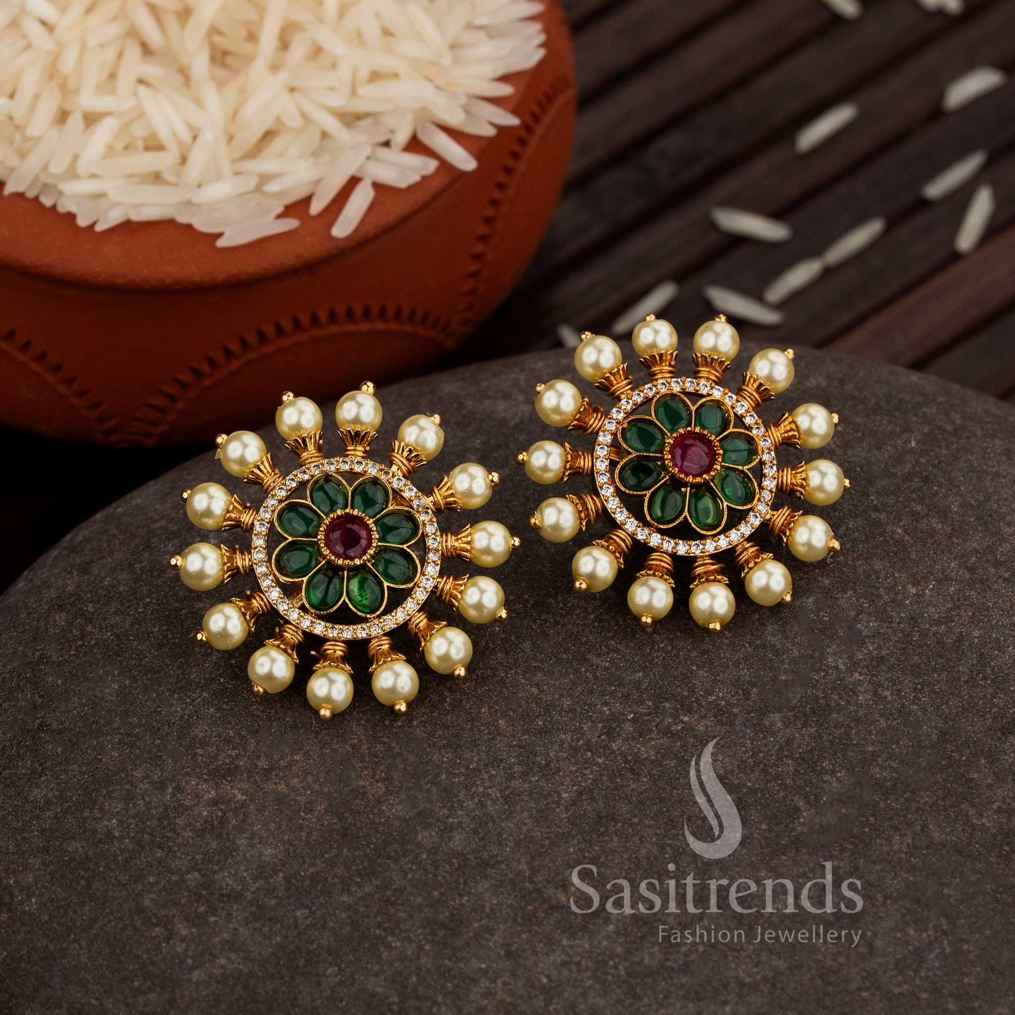 Grand Matte Gold Plated Floral Round Stud Earrings Adorned With Green-Ruby Pearl Border And Dazzling AD Stones, An Exquisite Ethnic Jewellery Creation For Traditional Celebrations – Sasitrends