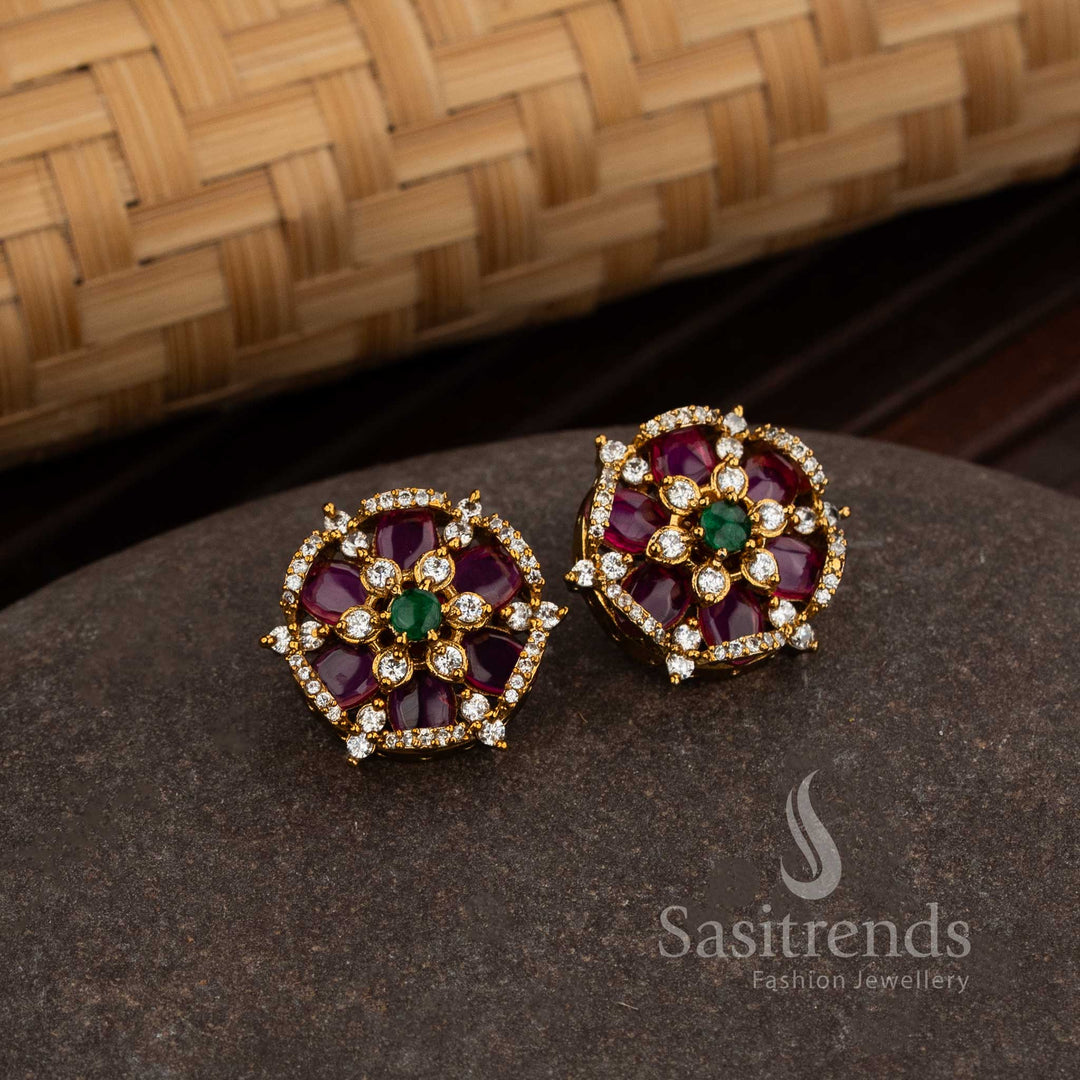 Matte Gold Plated Round Floral Stud Earrings With Ruby American Diamond Stone Highlights, Offering A Trendy Yet Traditional Jewellery Look For Cultural Events – Sasitrends