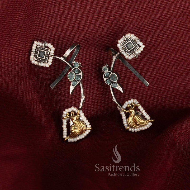 Attractive antique dual tone 92.5 silver oxidised ear cuff earrings featuring mint Monalisa stones, detailed peacock motif and artistic sculpting for refined ethnic styling - Sasitrends