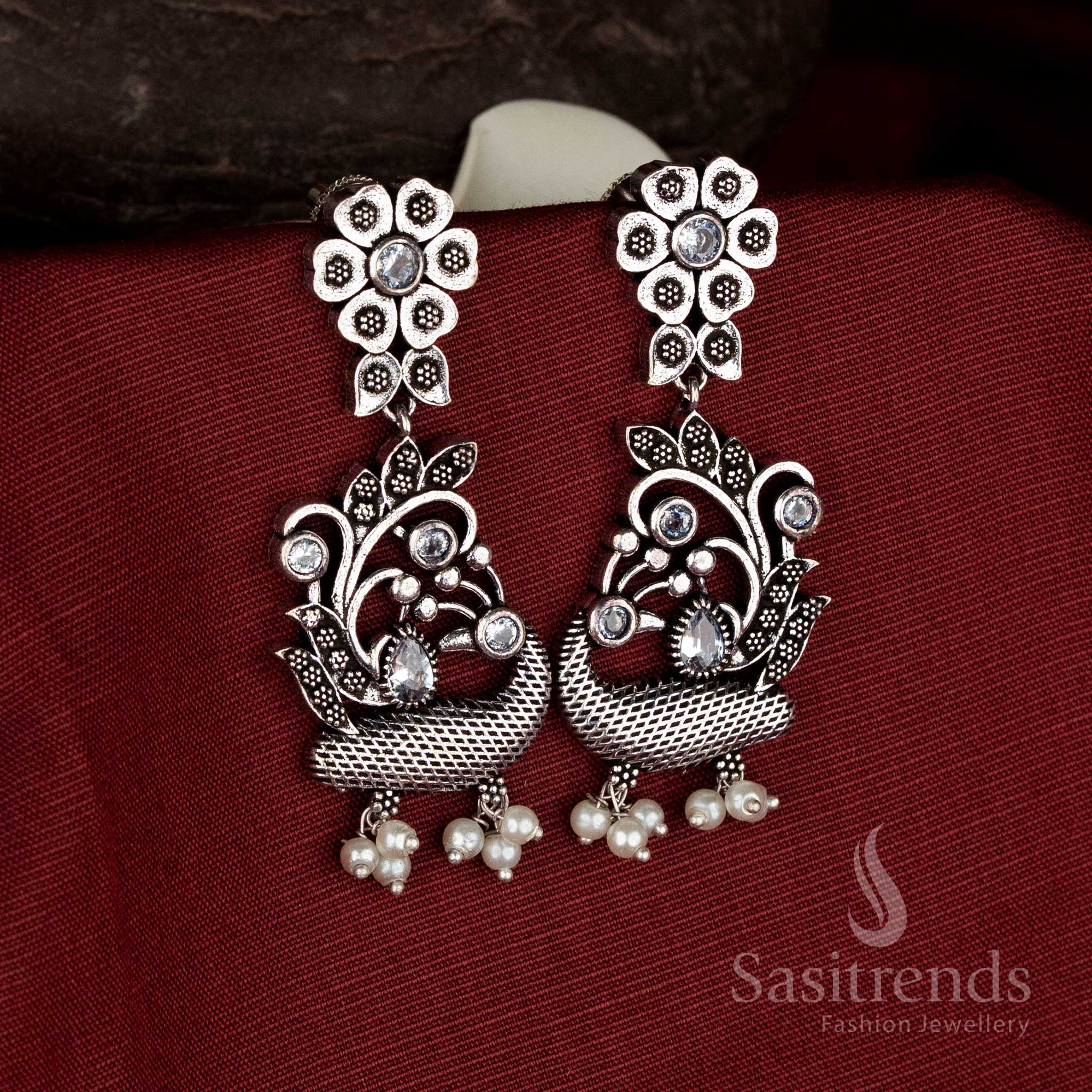 Charming oxidised silver floral peacock pearl drop earrings in white for Navarathri devotional jewellery - Sasitrends