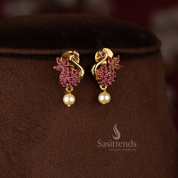 Delicate ruby matte gold peacock AD earrings, beautiful accessory for wedding and traditional occasions - Sasitrends
