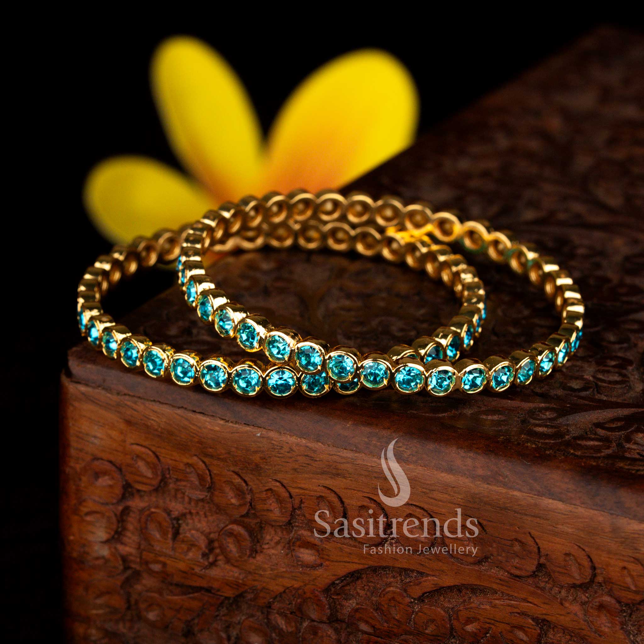 Beautiful micro gold plated Impon bangle jewellery showcasing traditional women wear design with sky blue para stone – Sasitrends