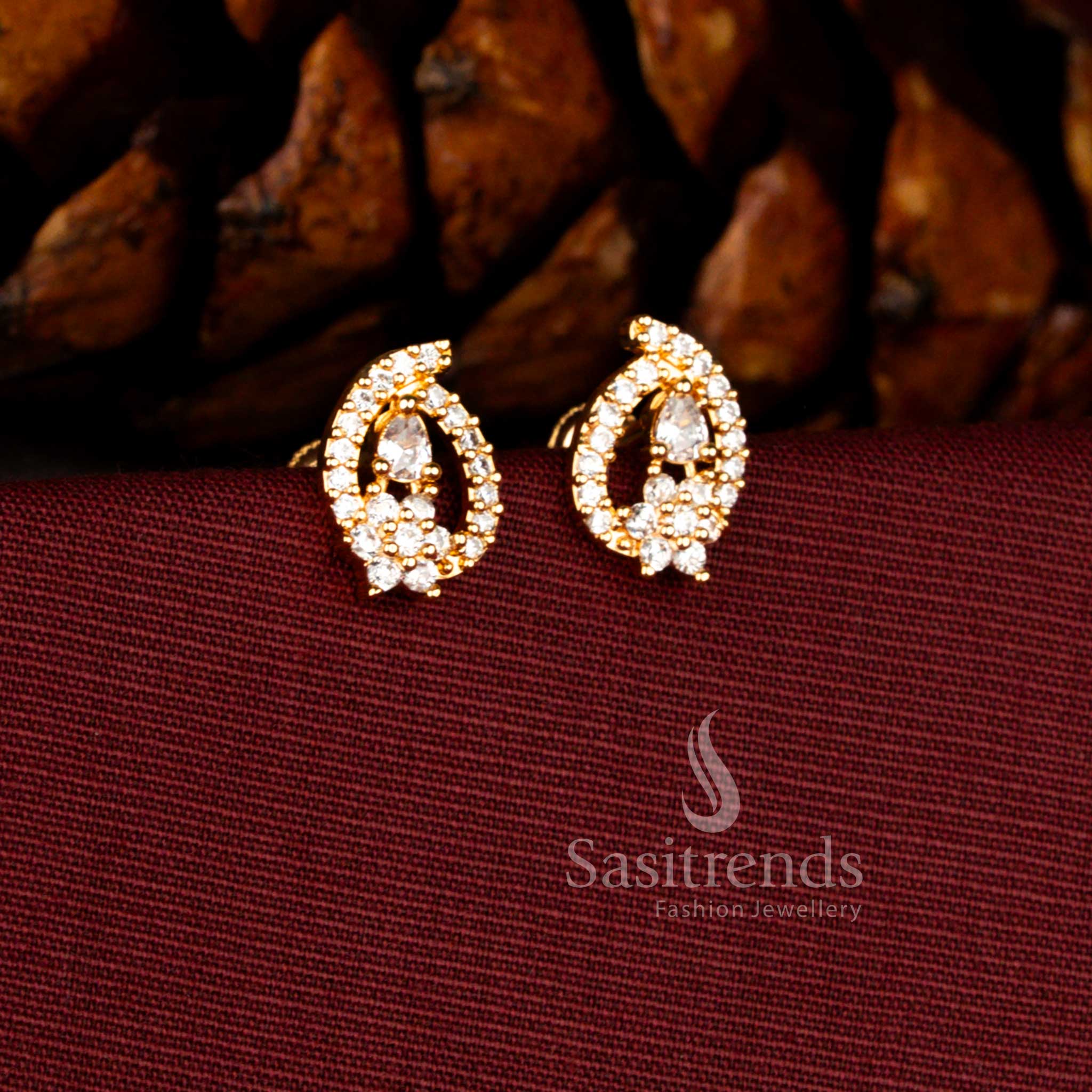 Radiant one gram earrings in white crafted with floral mango shape and sparkling teardrop American diamonds – Sasitrends