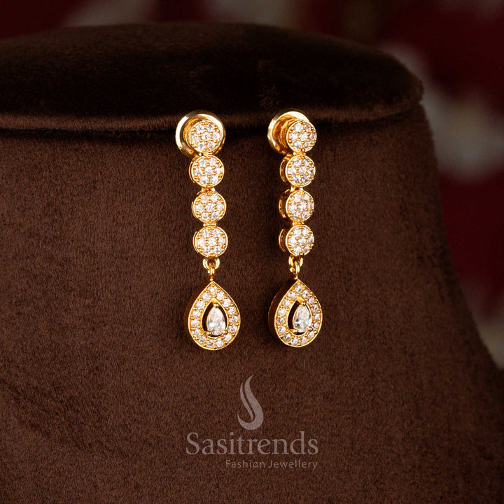 Elegant micro gold plated American Diamond teardrop earrings in white, complementing necklace with luxurious 24K gold finish – Sasitrends