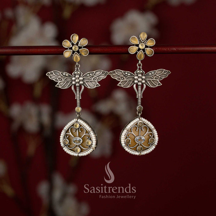 Beautiful Antique Oxidised 6-Petal Floral Dragonfly Wings Teardrop Earrings with Pearl Accents for Navarathri Wear - Sasitrends