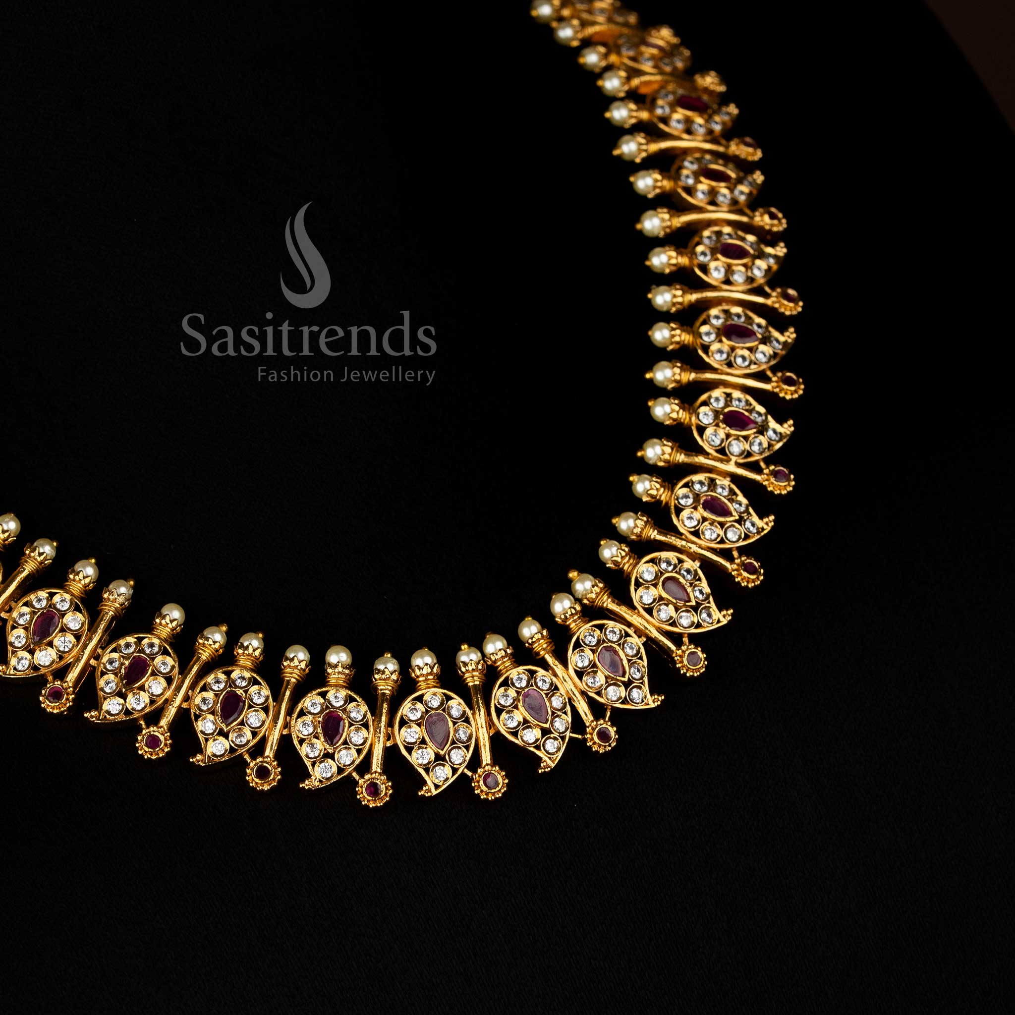 Traditional matte gold temple necklace set featuring intricate white ruby mango and stick designs with dazzling AD stones - Sasitrends