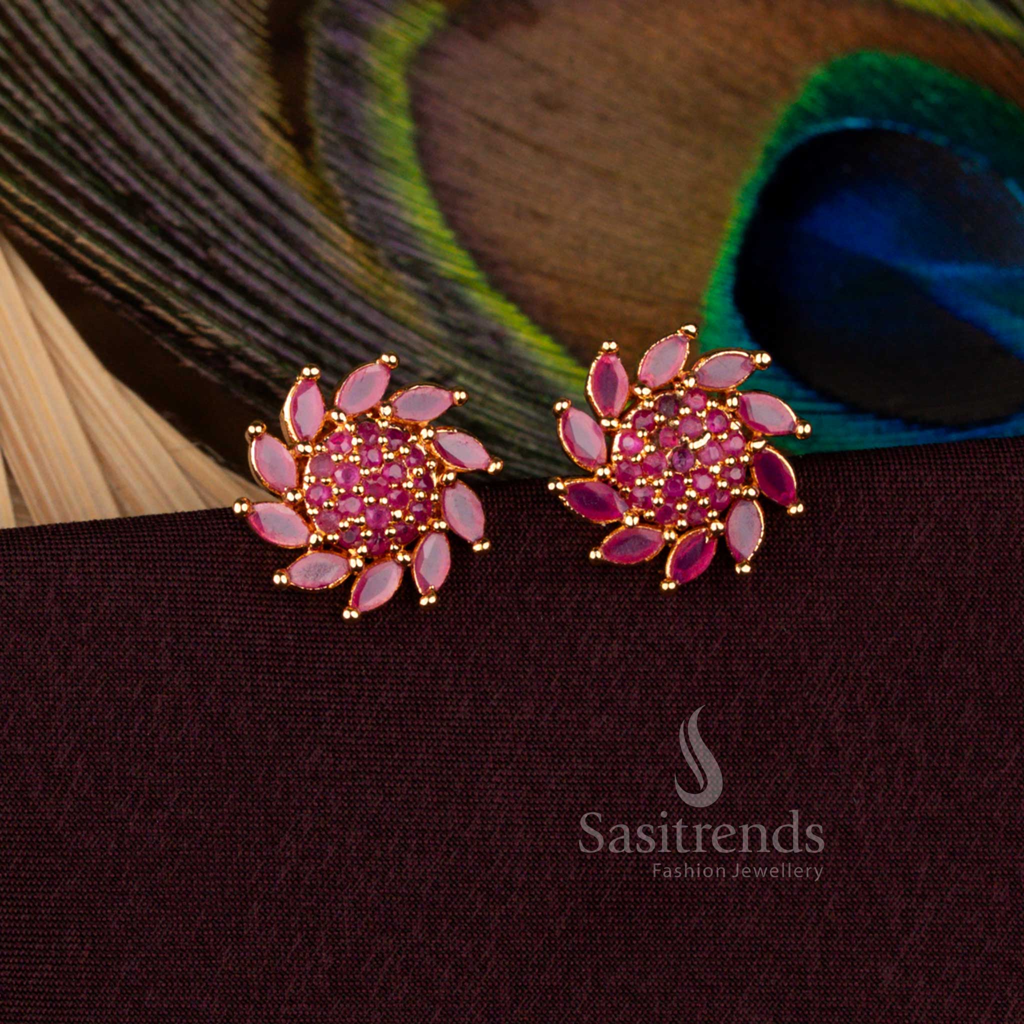 Majestic ruby floral AD stud earrings plated with micro gold radiating a 24 carat pure gold style, designed for weddings, cultural rituals, and ceremonial occasions - Sasitrends