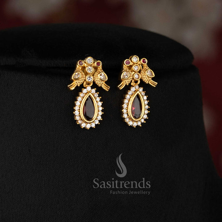 Stylish American diamond matte gold Earrings in ruby green for women, ideal for traditional and special occasions – Sasitrends