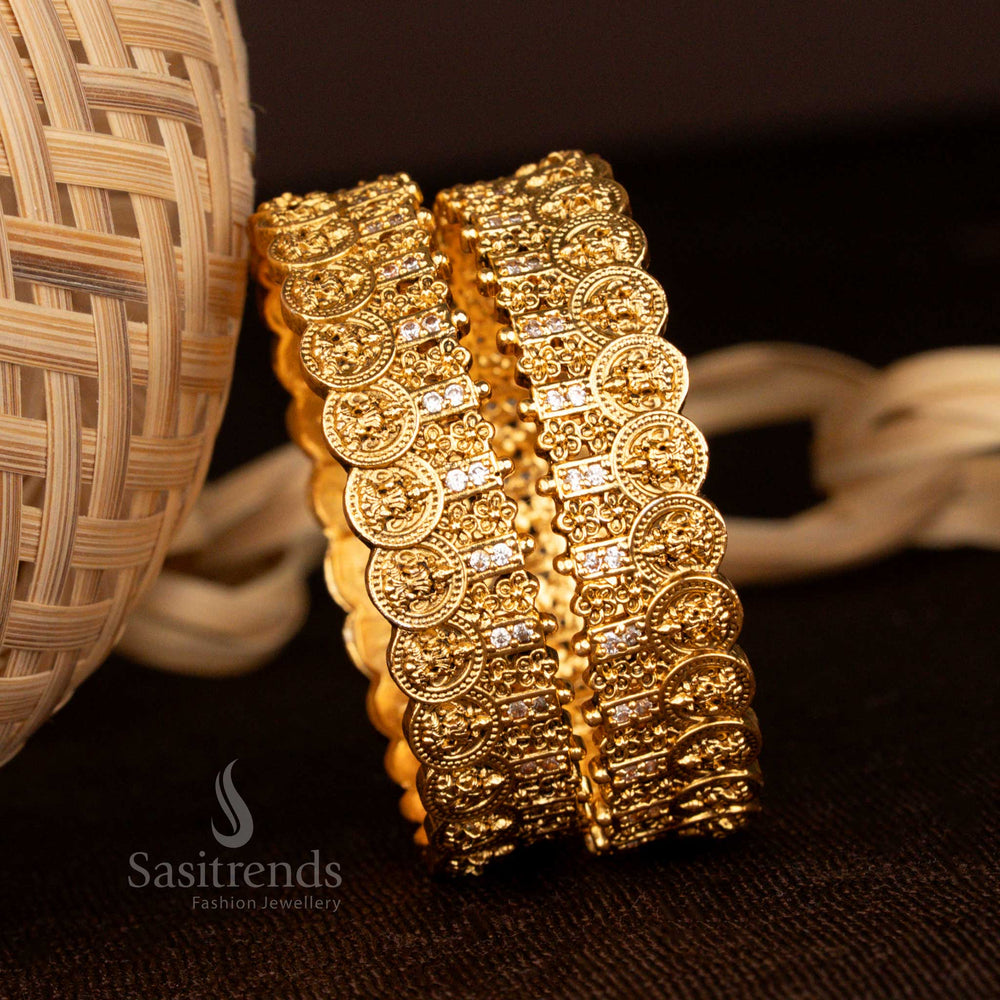 Imperial matte gold Lakshmi coin floral bangles designed with pearlescent white glow stones for a heritage bridal look - Sasitrends