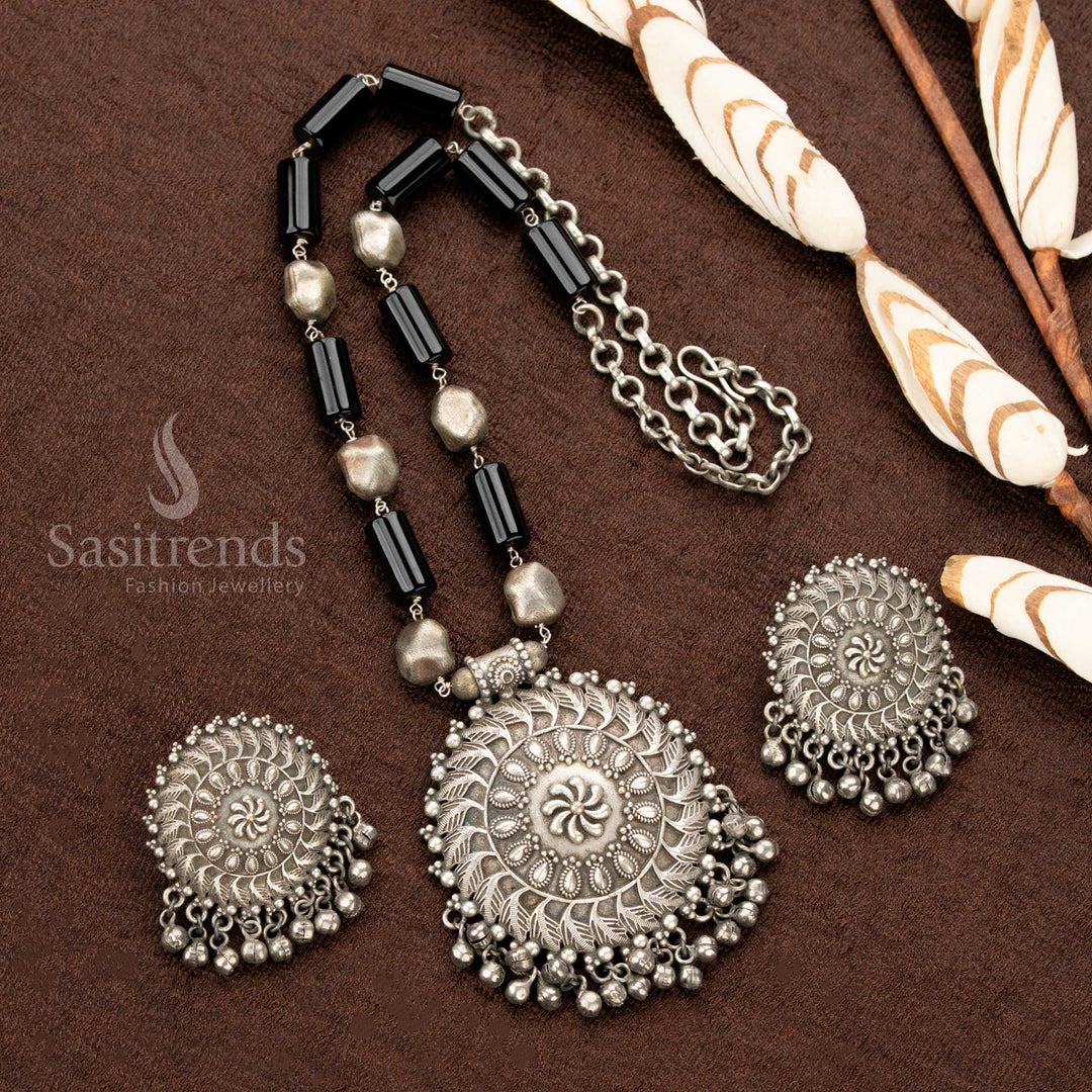 Stunning oxidised silver floral statement necklace, crafted with black gem highlights, a classic round pendant, and elegantly detailed earrings, a must-have piece for traditional jewellery lovers - Sasitrends