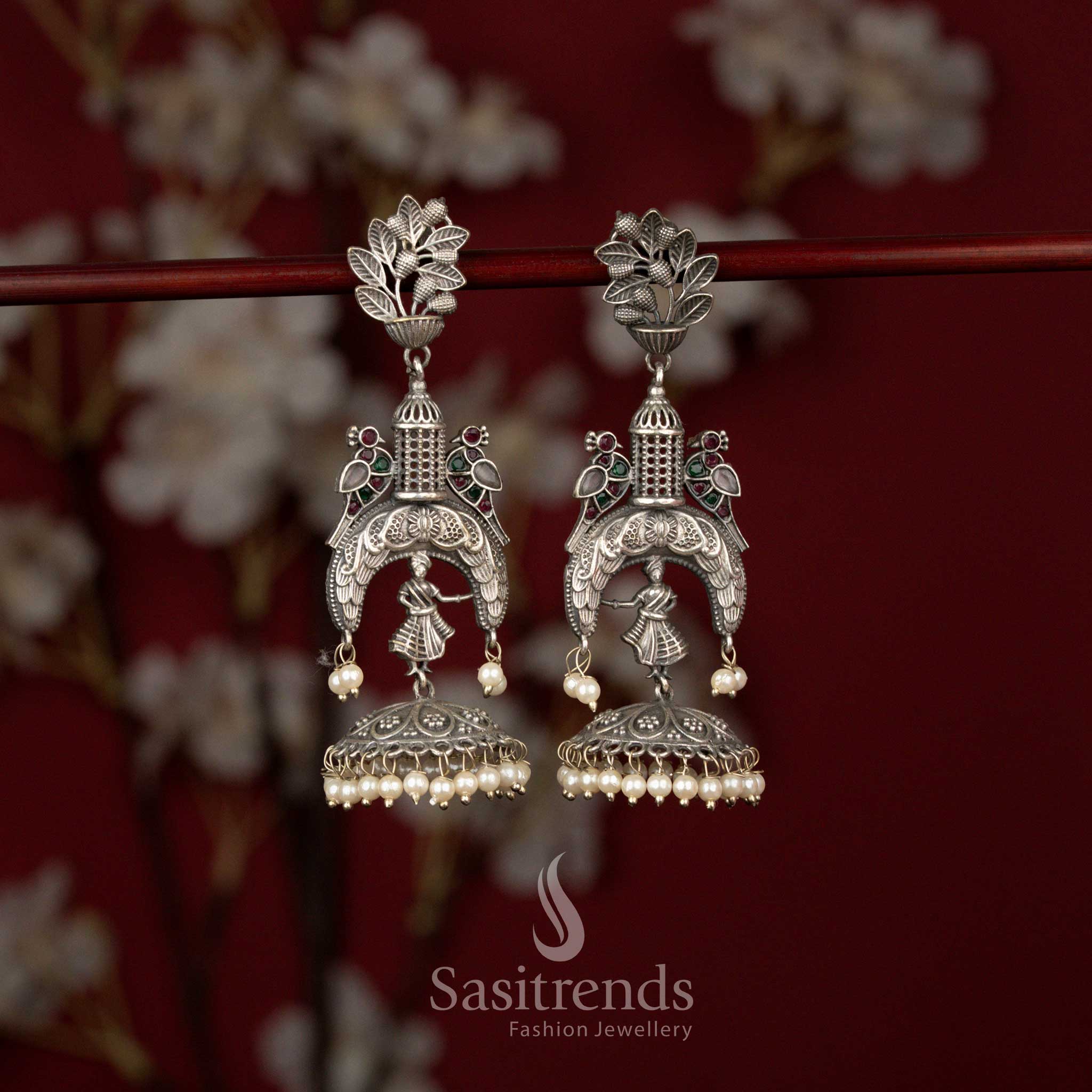 Resplendent oxidised temple style jhumka earrings adorned with multicolour accents, carved dancer form and pearl hangings ideal for celebrations and cultural wear – Sasitrends