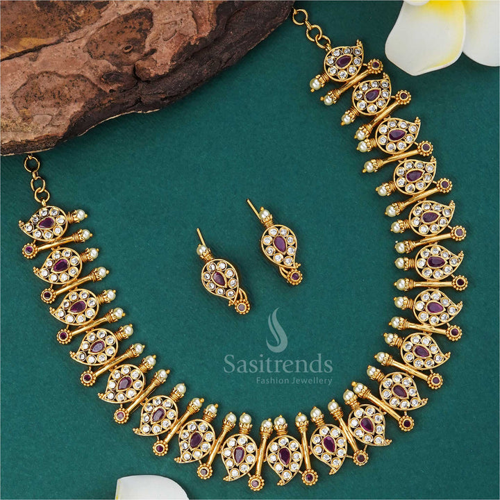 Elegant white-ruby temple matte gold necklace featuring detailed mango and stick motifs, embellished with sparkling AD stones for traditional wedding wear - Sasitrends