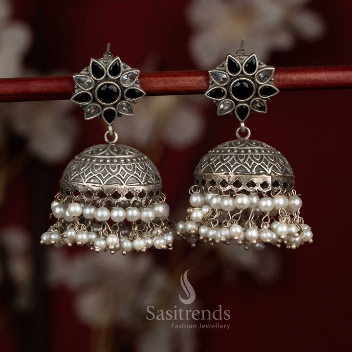 Shadow heritage oxidised 92.5 silver black white dome jhumkas with floral stone motifs and pearl cascades for festive charm - jewellery - Sasitrends