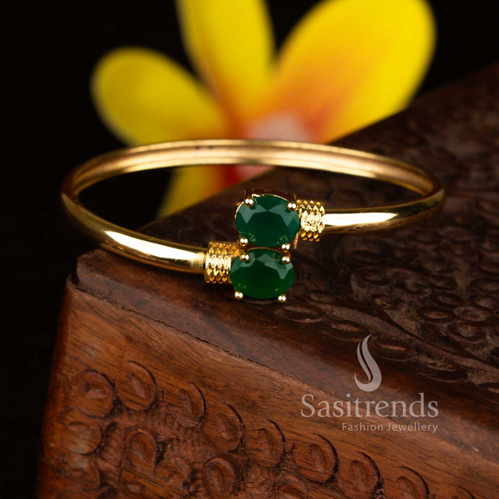 Graceful micro gold plated American diamond oval open bracelet designed for engagement occasions with beautiful green stone detailing – Sasitrends