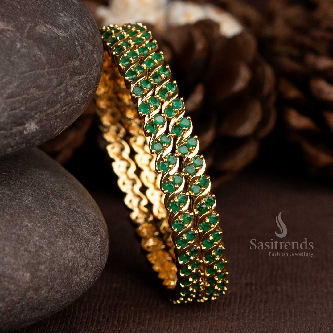 Guaranteed one gram gold plated spiral two line AD bangles with radiant green stones, designed for regal traditional looks and graceful festive occasions – Sasitrends