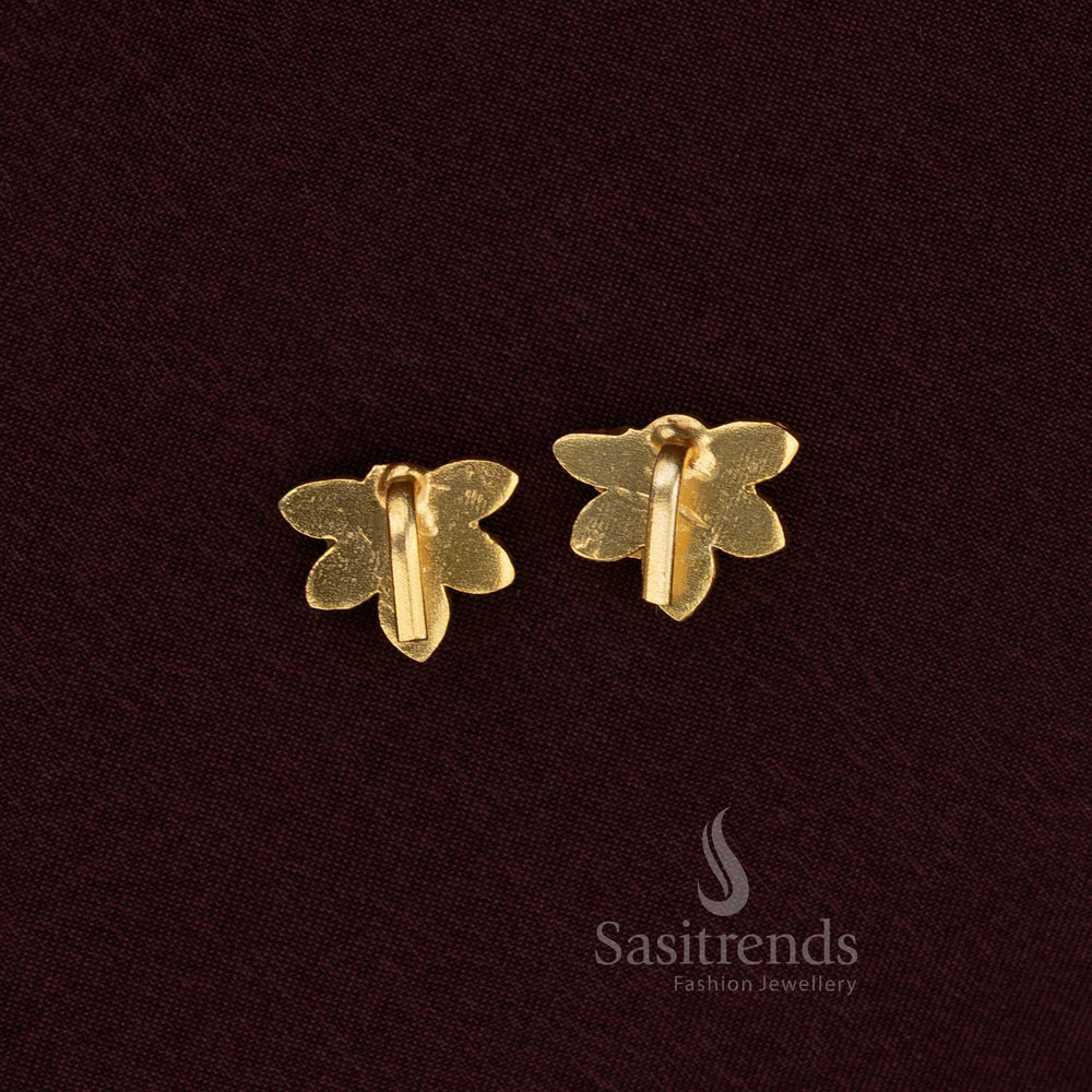 Handcrafted Jadau Bugadi earrings featuring lotus petal pattern and Kundan detailing in gold polish - Sasitrends