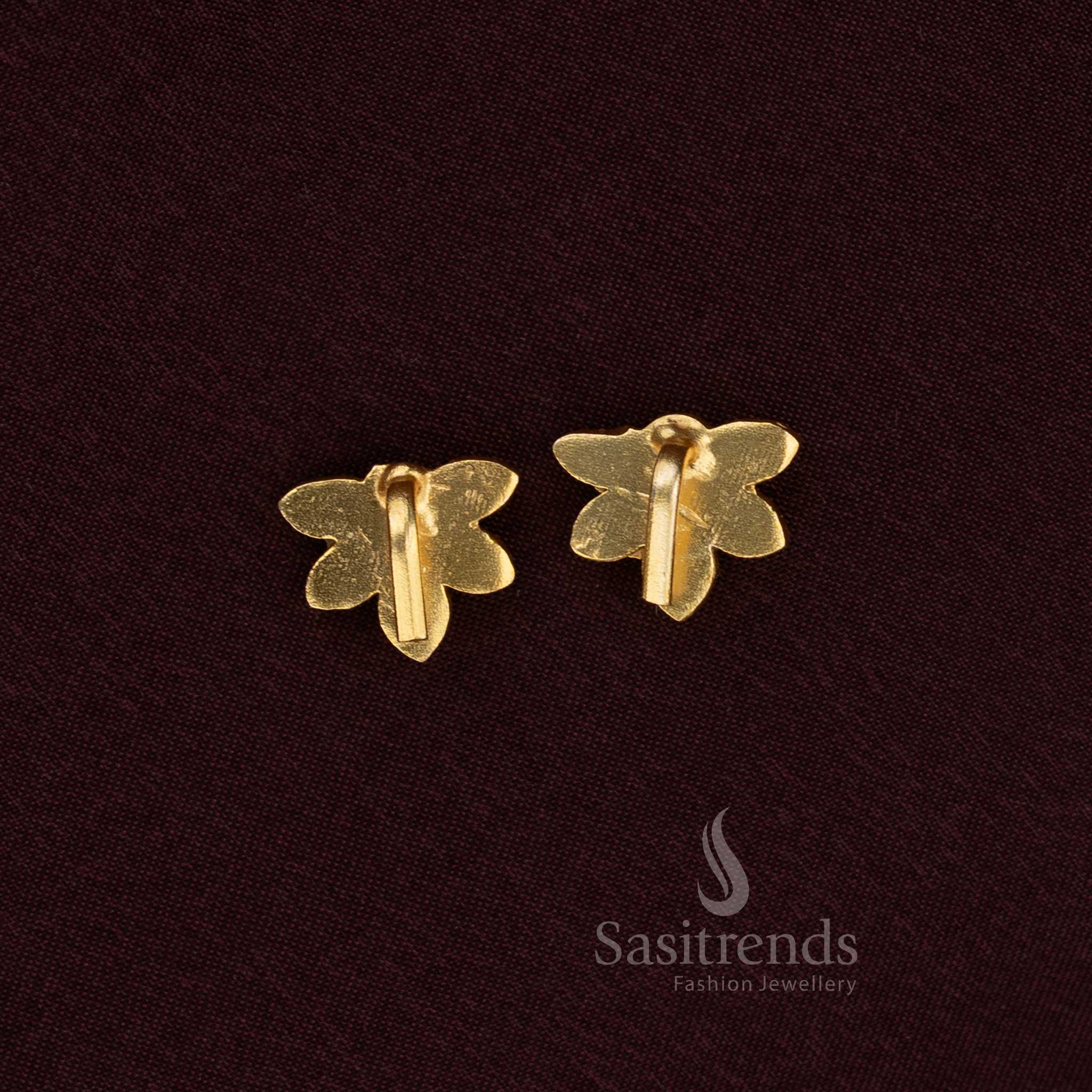 Handcrafted Jadau Bugadi earrings featuring lotus petal pattern and Kundan detailing in gold polish - Sasitrends