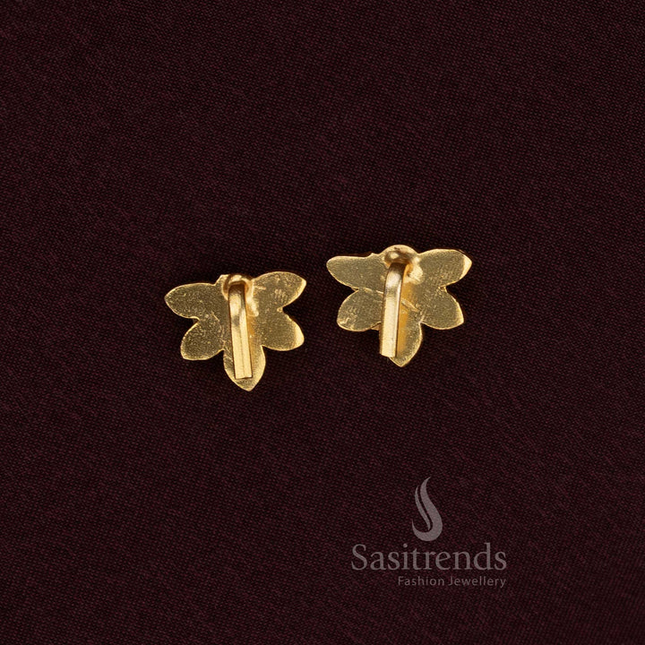Handcrafted Jadau Bugadi earrings featuring lotus petal pattern and Kundan detailing in gold polish - Sasitrends
