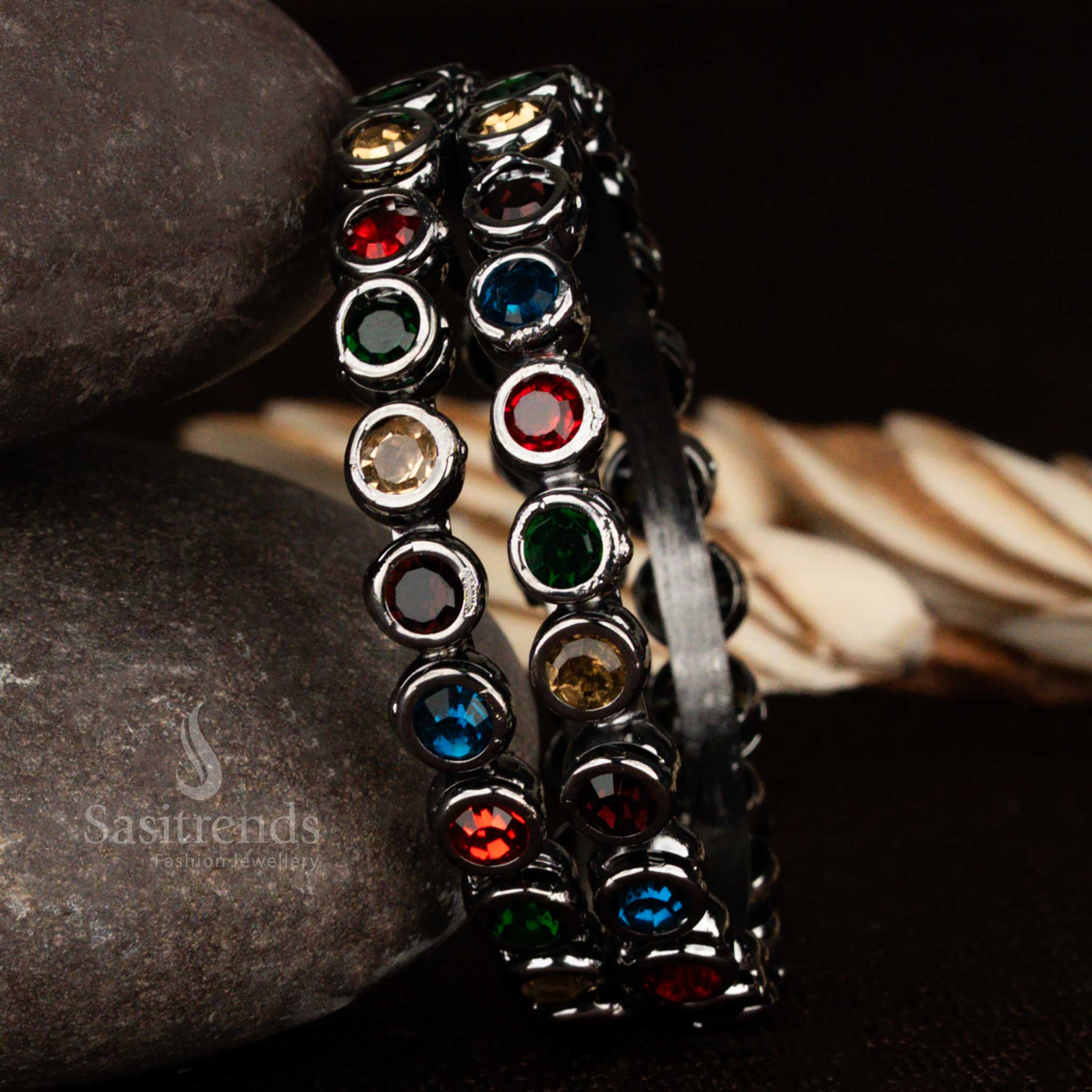 Vibrant multicolour stone oxidised black metal bangles with detailed floral engravings and a traditional oxidised finish, ideal for adding a pop of colour to any festive attire – Sasitrends
