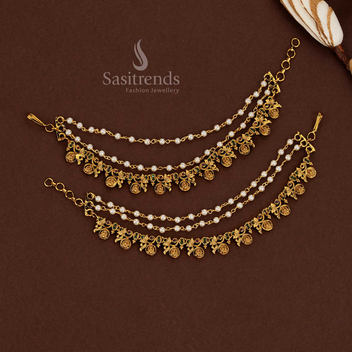 Intricately detailed Lakshmi temple matte gold plated American diamond matil ear chains featuring ruby-green stone harmony and pearl embellishments for wedding wear - Sasitrends