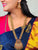 Matte Gold Traditional Long Necklace Set with Floral Pendant and Jhumkas