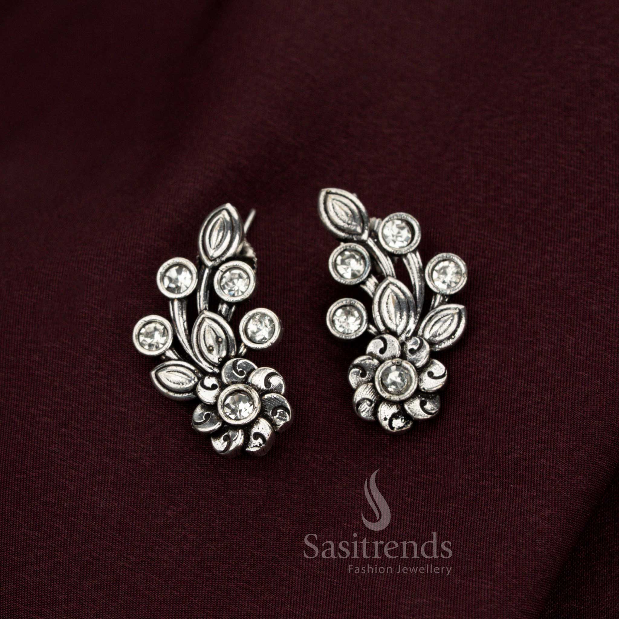 Divine white oxidised floral earrings designed with baroque detailing perfect for noble celebrations sovereign brides and resplendent jewellery beauty – Sasitrends