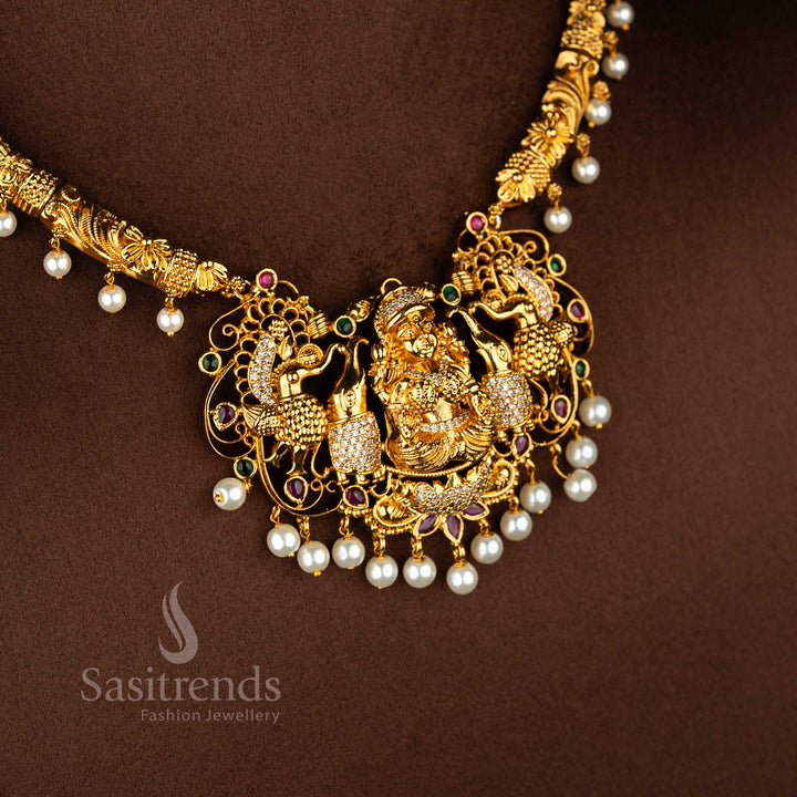 Regal legacy divine ornament collection portraying sacred Lakshmi imagery with peacock inspired craftsmanship elevated by multi tone stone arrangement – Sasitrends